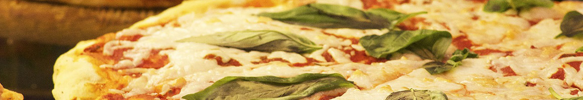Eating Pizza at Sugo's Pizza restaurant in Cheektowaga, NY.